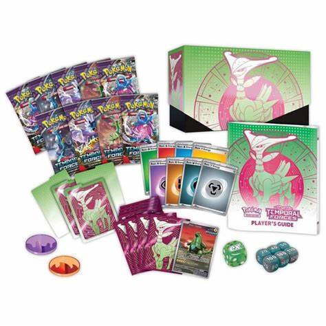 Coffret Pokémon ETB Forces Temporelles ouvert avec accessoires et cartes